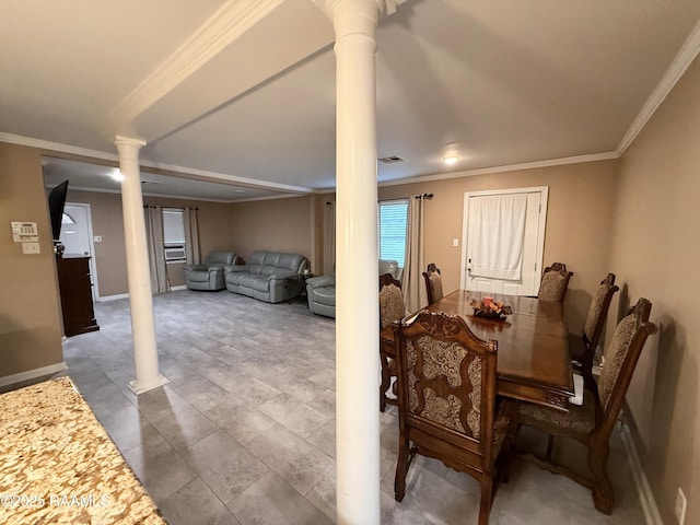 122 Buckner Rd, Eunice, LA 70535 - dining area with ornate columns and ornamental molding