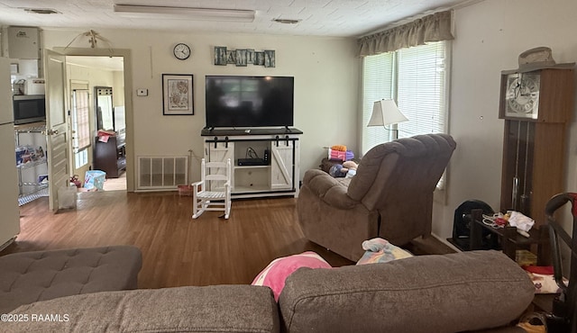 3492 Bayou Gerimond Rd, Port Barre, LA 70577 - living area with wood finished floors