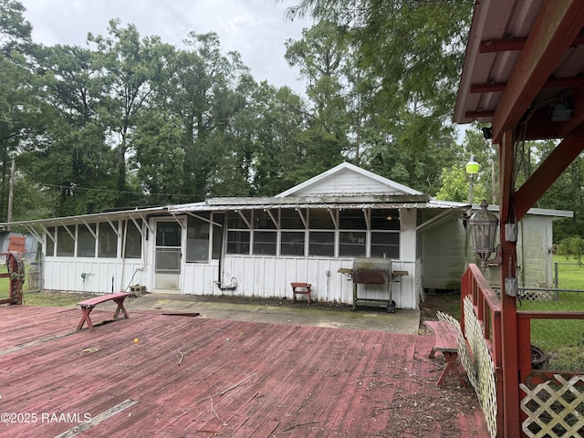 3492 Bayou Gerimond Rd, Port Barre, LA 70577 - wooden terrace featuring a sunroom and grilling area