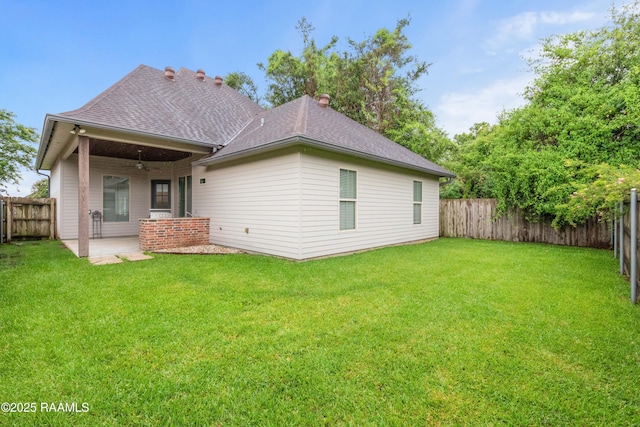 106 Whitewater Dr, Broussard, LA 70518 - rear view of house featuring ceiling fan, a fenced backyard, roof with shingles, and a patio area