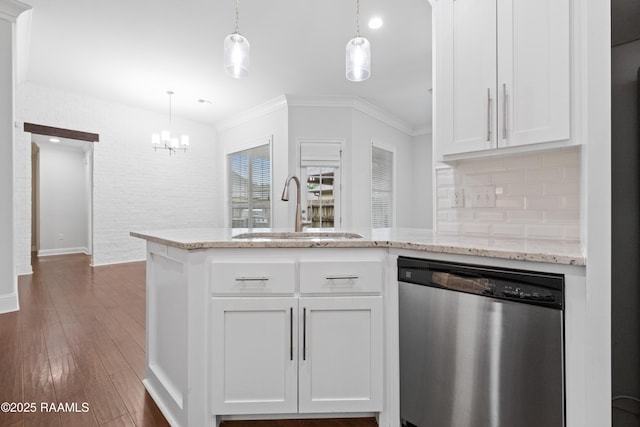 106 Whitewater Dr, Broussard, LA 70518 - kitchen featuring dishwasher, wood finished floors, a chandelier, backsplash, and white cabinetry