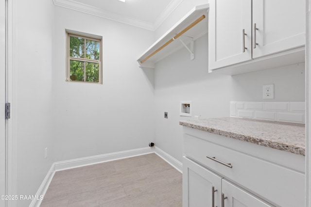 106 Whitewater Dr, Broussard, LA 70518 - laundry room featuring hookup for a washing machine, electric dryer hookup, crown molding, and cabinet space