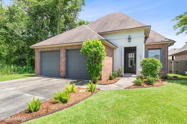 106 Whitewater Dr, Broussard, LA 70518 - view of front of home featuring a shingled roof, brick siding, concrete driveway, and a garage