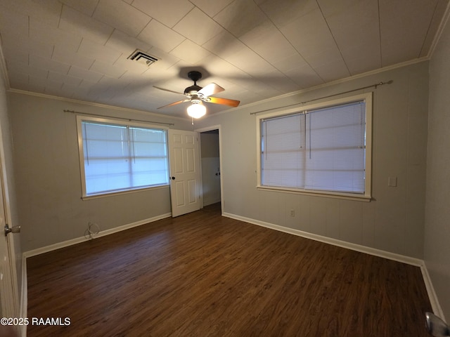 119 Romero St, Youngsville, LA 70592 - unfurnished bedroom featuring crown molding, dark wood-type flooring, and ceiling fan