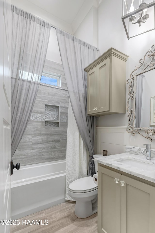 403 Catalina Ln, Youngsville, LA 70592 - bathroom featuring vanity, shower / bath combo, and wood finished floors