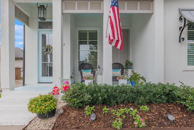 403 Catalina Ln, Youngsville, LA 70592 - property entrance with stucco siding and covered porch