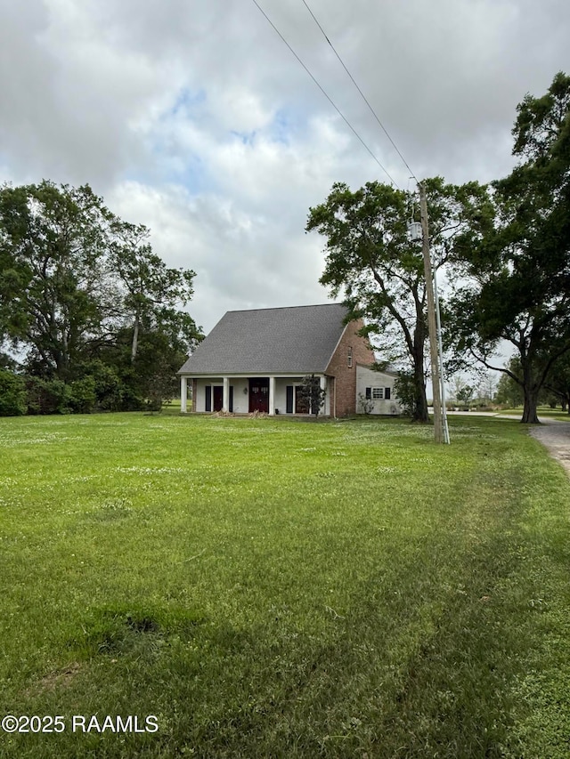 14439 Gladu Rd, Kaplan, LA 70548 - view of front of house featuring a front yard