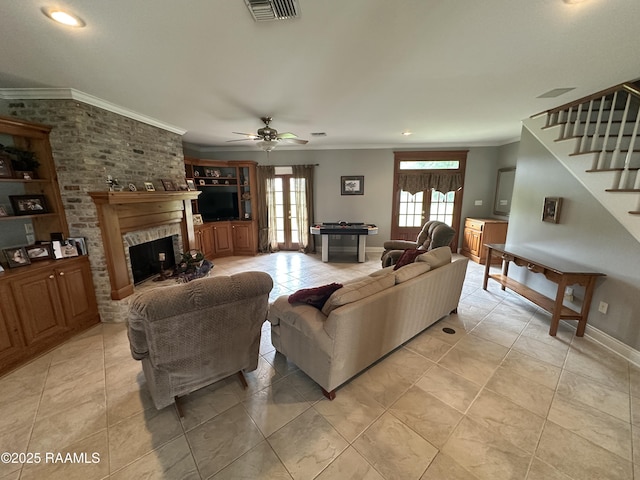 14439 Gladu Rd, Kaplan, LA 70548 - living area with stairway, crown molding, recessed lighting, light tile patterned floors, and a fireplace