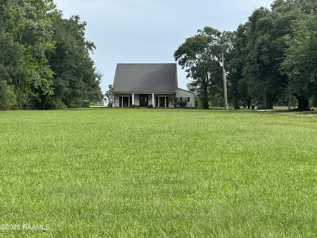 14439 Gladu Rd, Kaplan, LA 70548 - view of front of property with a front lawn