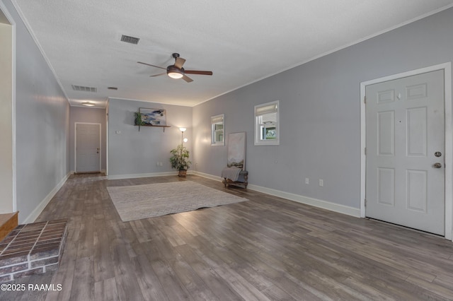 101 Sherry St, Baldwin, LA 70514 - foyer with ceiling fan, wood finished floors, and ornamental molding