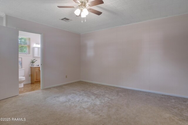 101 Sherry St, Baldwin, LA 70514 - empty room with light carpet, a ceiling fan, and ornamental molding