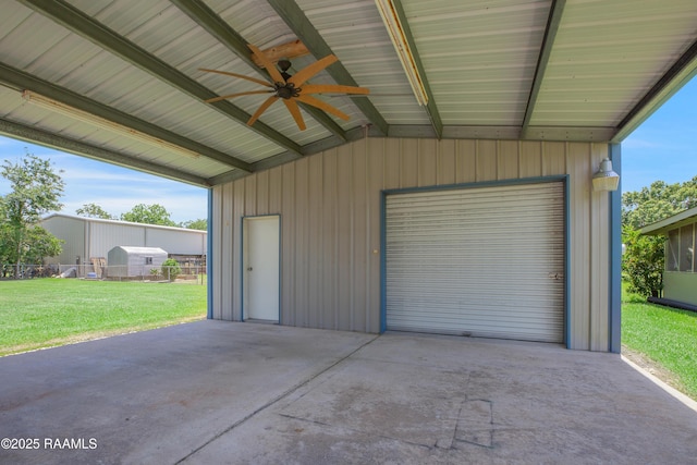 101 Sherry St, Baldwin, LA 70514 - garage with ceiling fan, a garage, and concrete driveway