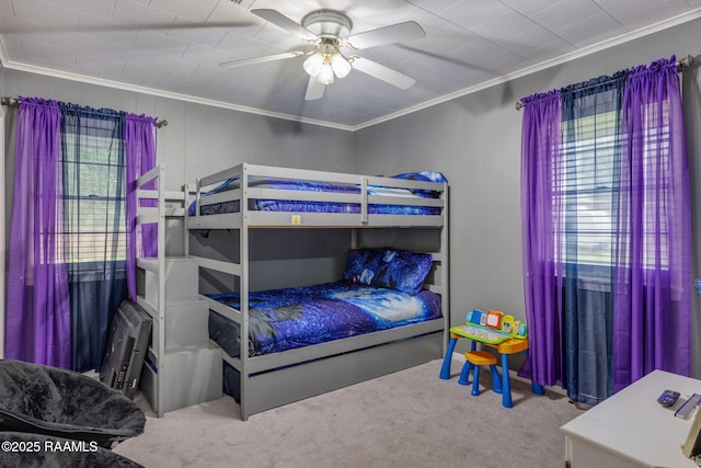 522 Caroline St, New Iberia, LA 70560 - bedroom featuring crown molding, carpet, and a ceiling fan