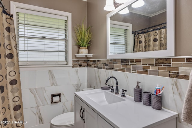 522 Caroline St, New Iberia, LA 70560 - full bath with plenty of natural light, vanity, and tile walls