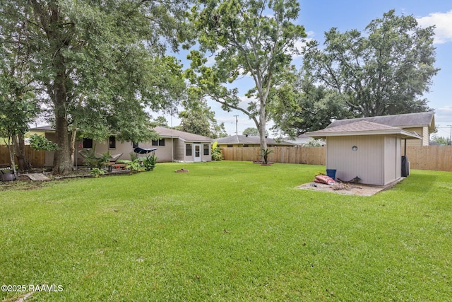 522 Caroline St, New Iberia, LA 70560 - fenced backyard featuring a storage shed