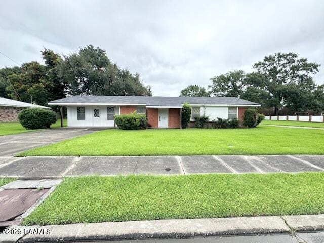 110 W Tampico St, New Iberia, LA 70563 - single story home with a front lawn and asphalt driveway