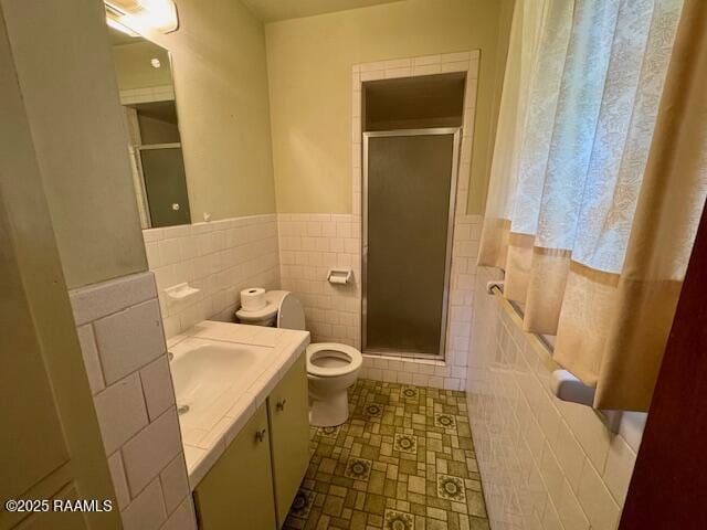 110 W Tampico St, New Iberia, LA 70563 - full bathroom with a shower stall, vanity, tile walls, and wainscoting