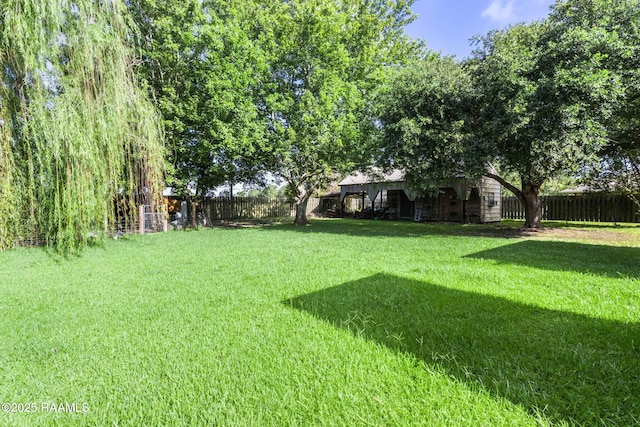 13723 Lynnedale Loop, Abbeville, LA 70510 - view of fenced backyard