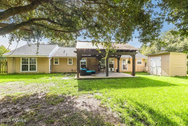 13723 Lynnedale Loop, Abbeville, LA 70510 - back of property with a patio area, a shed, a yard, and a gazebo