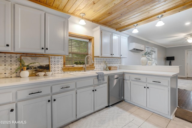 610 Ashton St, New Iberia, LA 70563 - kitchen with dishwasher, a peninsula, light countertops, backsplash, and a wall mounted AC