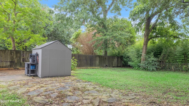 610 Ashton St, New Iberia, LA 70563 - fenced backyard featuring a storage shed