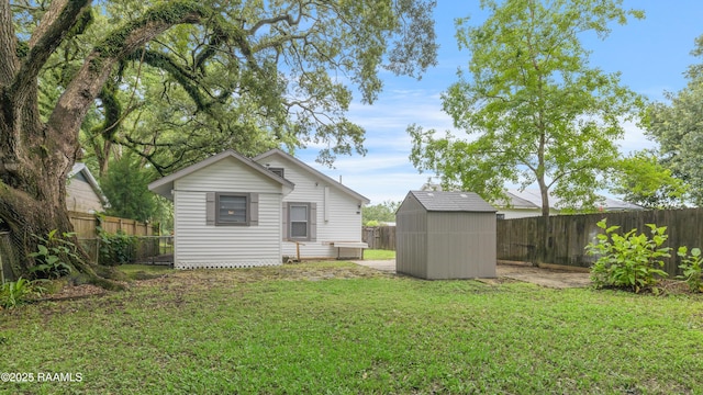 610 Ashton St, New Iberia, LA 70563 - fenced backyard with a storage shed