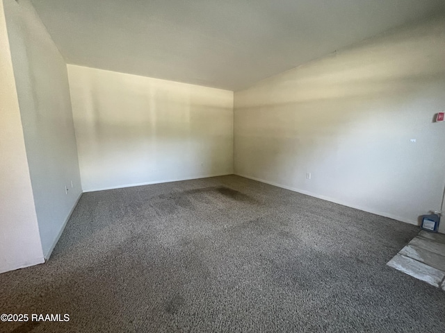 3121 Johnston St Apt 139, Lafayette, LA 70503 - unfurnished room featuring carpet flooring and lofted ceiling