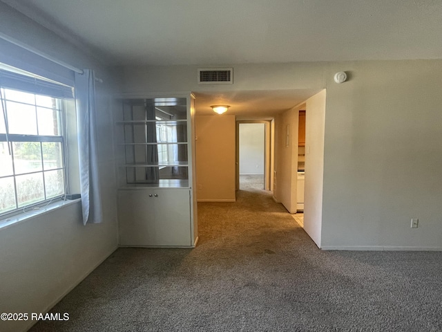 3121 Johnston St Apt 139, Lafayette, LA 70503 - spare room featuring carpet flooring and a smoke detector