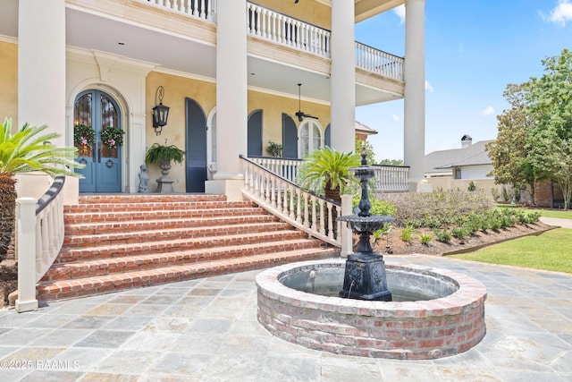 232 Princeton Woods Loop, Lafayette, LA 70508 - view of exterior entry with a porch and stucco siding
