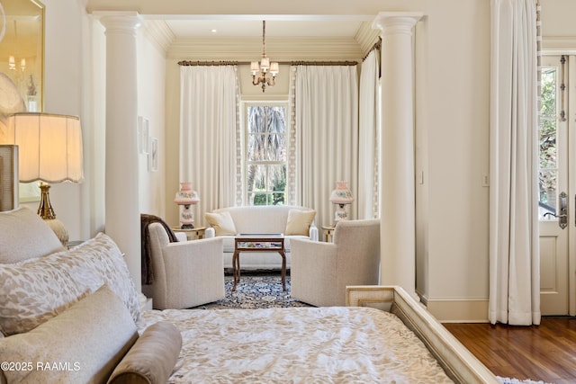 232 Princeton Woods Loop, Lafayette, LA 70508 - bedroom with wood finished floors, ornate columns, and crown molding