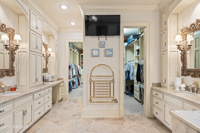 232 Princeton Woods Loop, Lafayette, LA 70508 - full bath with two vanities, a spacious closet, ornamental molding, and recessed lighting