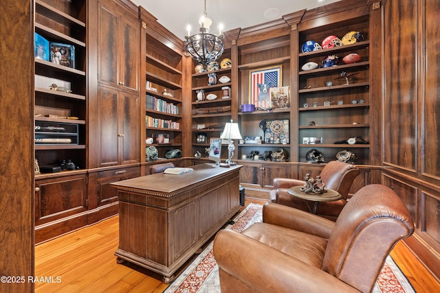 232 Princeton Woods Loop, Lafayette, LA 70508 - home office featuring a chandelier, light wood finished floors, and built in shelves