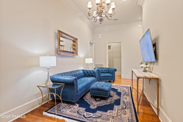 232 Princeton Woods Loop, Lafayette, LA 70508 - living room with ornamental molding, a chandelier, and wood finished floors