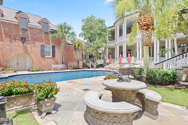 232 Princeton Woods Loop, Lafayette, LA 70508 - outdoor pool with a patio