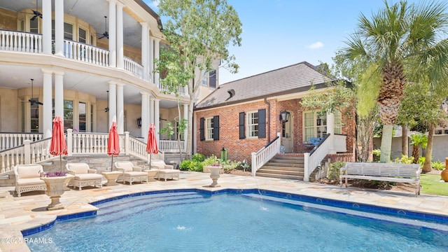 232 Princeton Woods Loop, Lafayette, LA 70508 - swimming pool with a ceiling fan and stairway