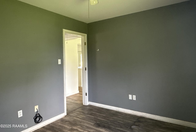 14927 S Guegnon St, Abbeville, LA 70510 - spare room with dark wood-style flooring and ceiling fan
