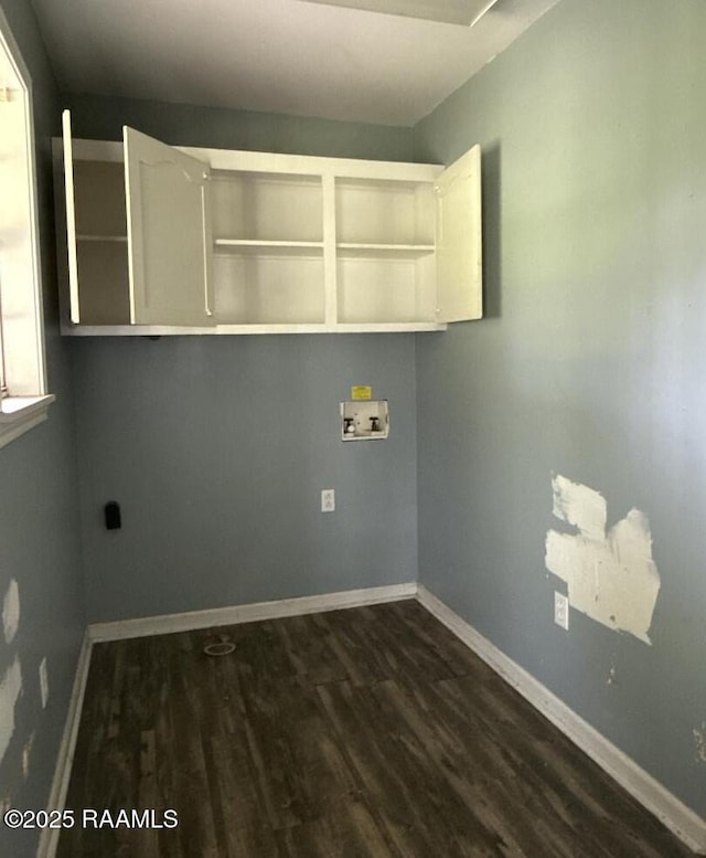14927 S Guegnon St, Abbeville, LA 70510 - washroom with washer hookup, dark wood finished floors, and electric dryer hookup