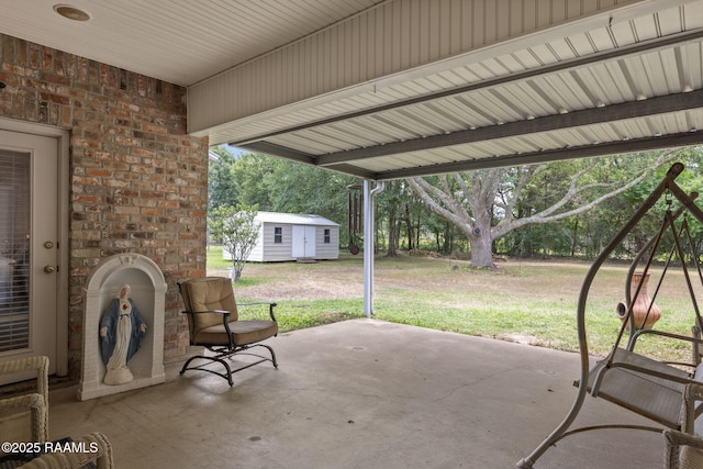 104 Briarfield Dr, Carencro, LA 70520 - view of patio featuring an outbuilding