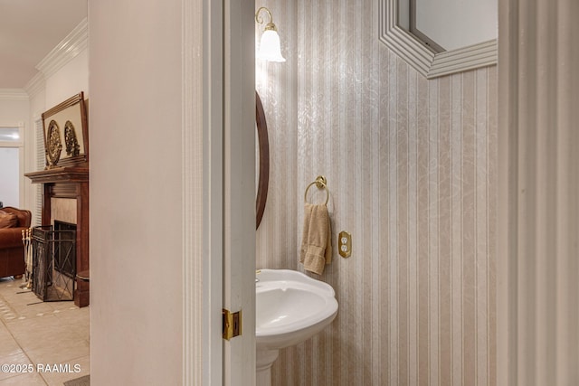104 Briarfield Dr, Carencro, LA 70520 - bathroom with crown molding, a large fireplace, tile patterned flooring, and wallpapered walls
