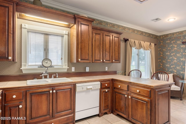 104 Briarfield Dr, Carencro, LA 70520 - kitchen with dishwasher, tile countertops, a peninsula, light tile patterned floors, and wallpapered walls
