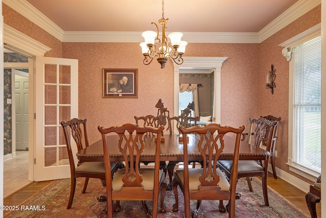 104 Briarfield Dr, Carencro, LA 70520 - dining area featuring a chandelier, wood finished floors, and crown molding