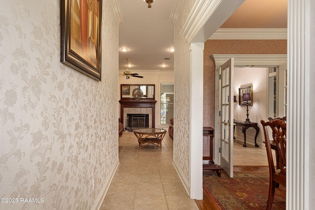 104 Briarfield Dr, Carencro, LA 70520 - hall with crown molding, light tile patterned flooring, and wallpapered walls