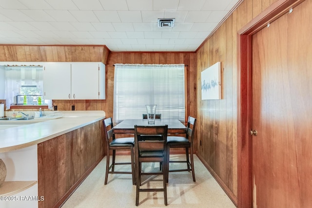 107 Julenie Way, Youngsville, LA 70592 - dining area featuring wood walls