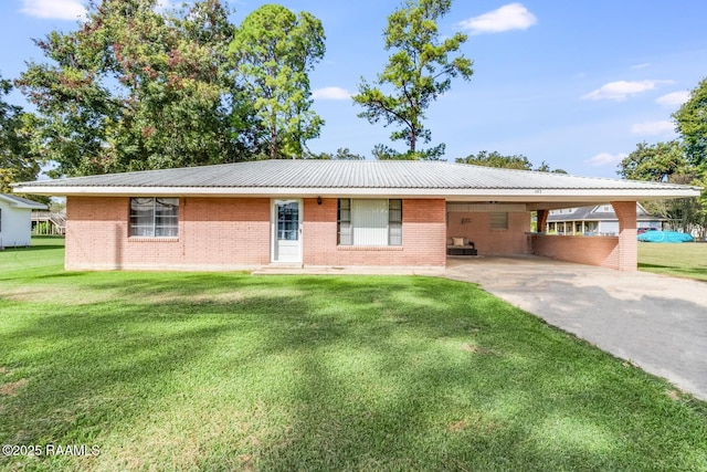 107 Julenie Way, Youngsville, LA 70592 - ranch-style house with a front yard, a carport, brick siding, and concrete driveway