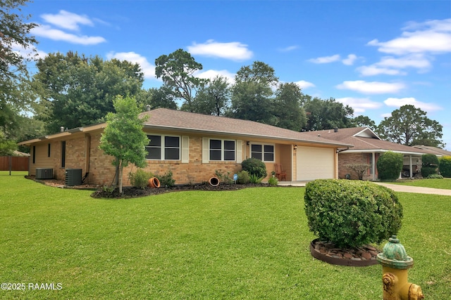 177 Radcliffe Dr, Lafayette, LA 70501 - ranch-style house with brick siding, an attached garage, a front lawn, and concrete driveway