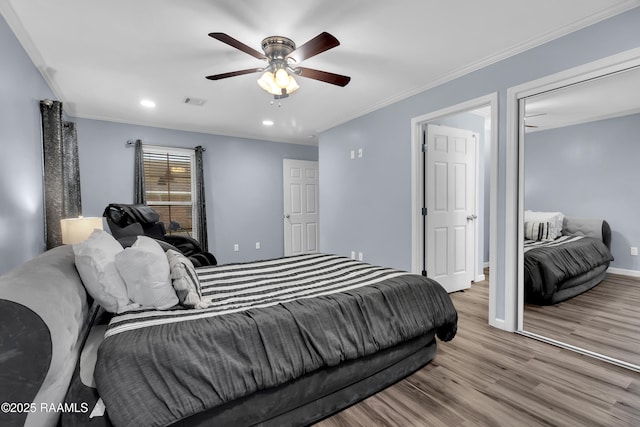 177 Radcliffe Dr, Lafayette, LA 70501 - bedroom featuring wood finished floors, crown molding, recessed lighting, and a ceiling fan