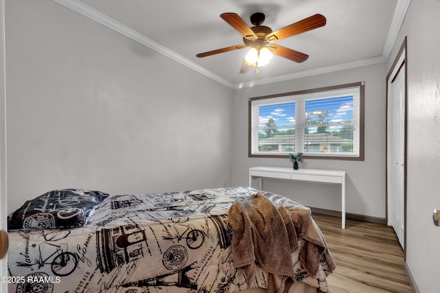 177 Radcliffe Dr, Lafayette, LA 70501 - bedroom with light wood-style floors, crown molding, a closet, and ceiling fan