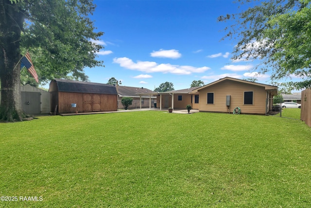 177 Radcliffe Dr, Lafayette, LA 70501 - back of property with a storage shed and a patio area