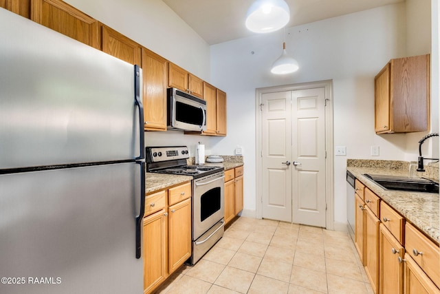 201 Settlers Trace Blvd Unit 4404, Lafayette, LA 70508 - kitchen featuring stainless steel appliances, light tile patterned floors, and light stone countertops