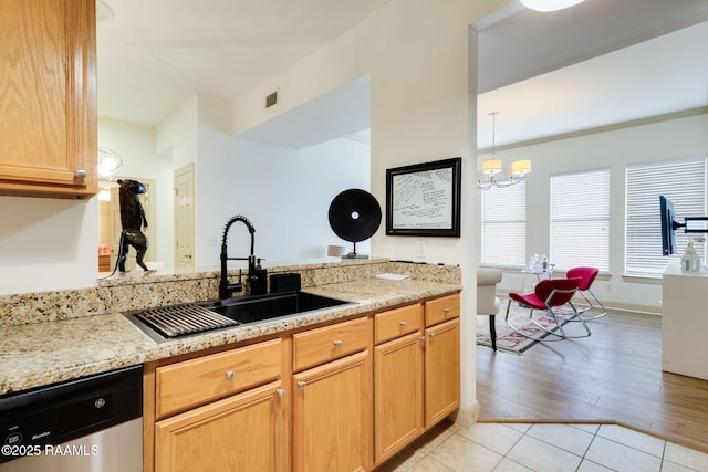 201 Settlers Trace Blvd Unit 4404, Lafayette, LA 70508 - kitchen with dishwasher, light tile patterned floors, light stone countertops, and a chandelier